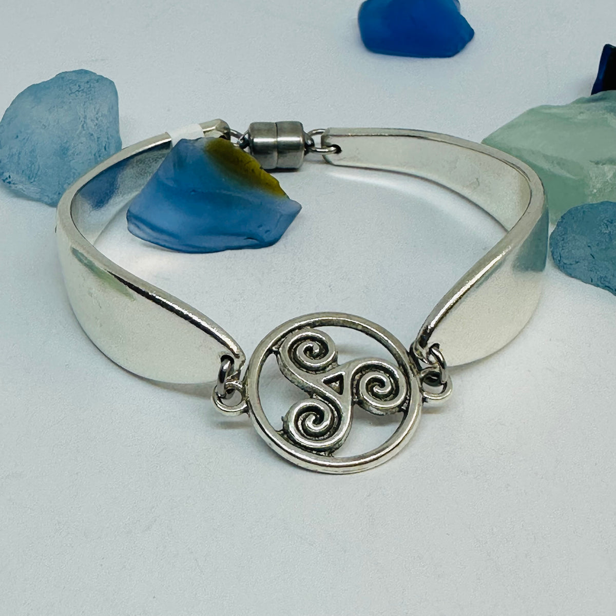 Lady Hamilton 1932 vintage spoon bracelet with a triskele Celtic connector charm on a wide band.